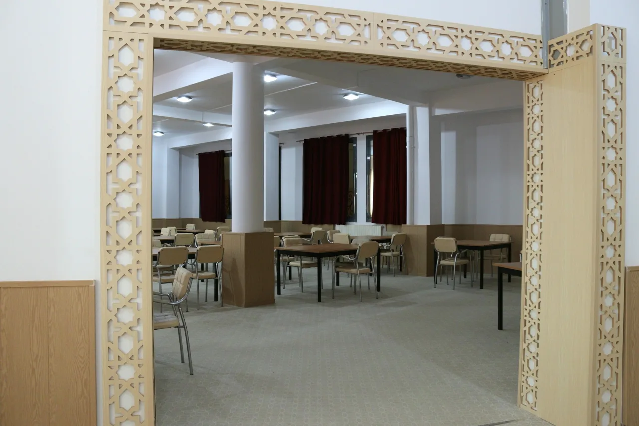 Entrance to the reading room, framed by a carved wooden portico