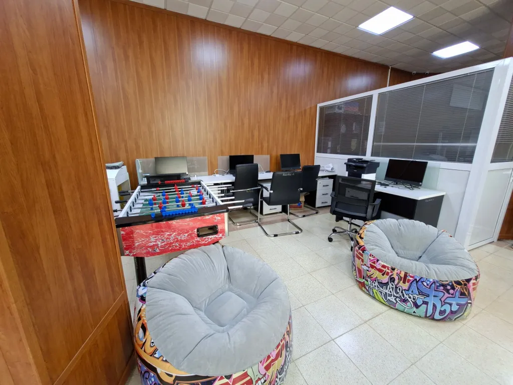 Workstations and break area in the co-working space