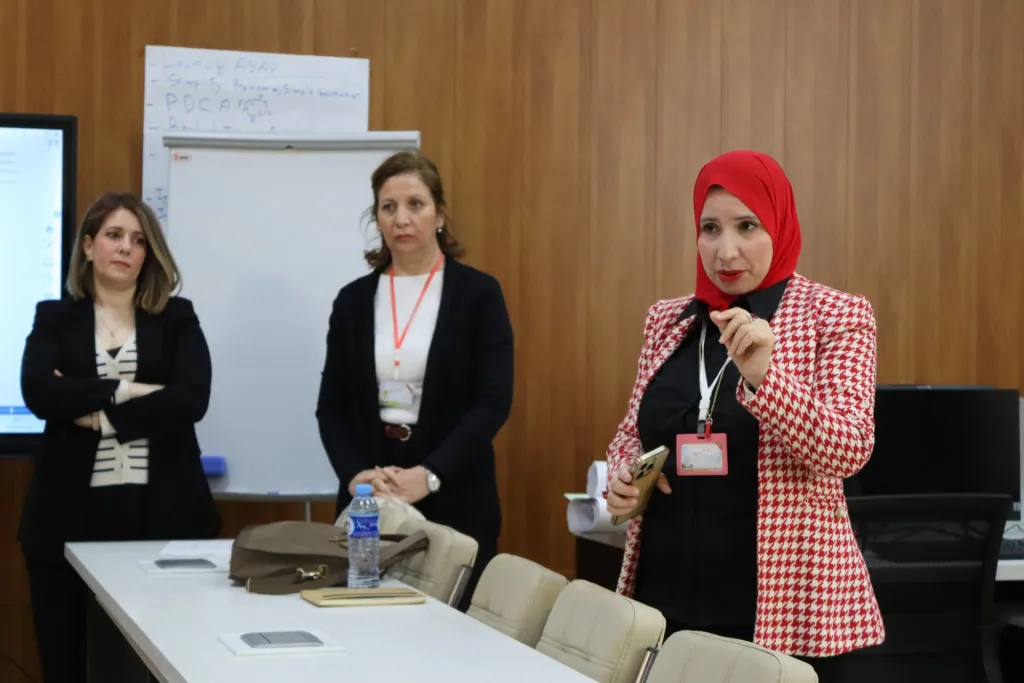 A speaker addresses participants during an incubator workshop